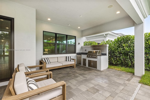 13467 Artisan Cir, Palm Beach Gardens, FL 33418 - view of patio / terrace featuring exterior kitchen and an outdoor hangout area