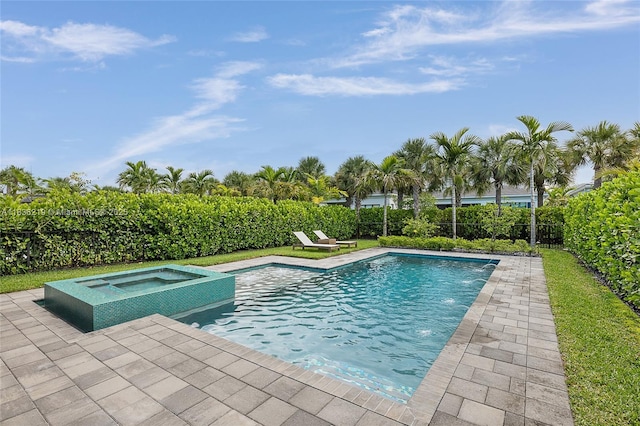 13467 Artisan Cir, Palm Beach Gardens, FL 33418 - view of pool with a pool with connected hot tub and a patio area