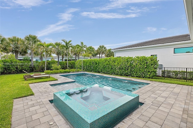 13467 Artisan Cir, Palm Beach Gardens, FL 33418 - view of swimming pool featuring a patio area and a pool with connected hot tub
