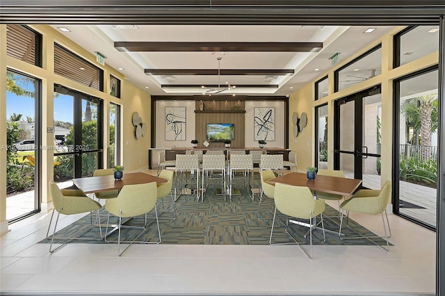 13467 Artisan Cir, Palm Beach Gardens, FL 33418 - dining room with french doors, healthy amount of natural light, and tile patterned flooring