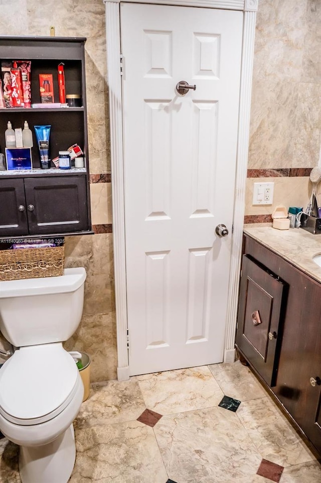 1004 NE 151st Ter, North Miami Beach, FL 33162 - bathroom featuring vanity and tile walls