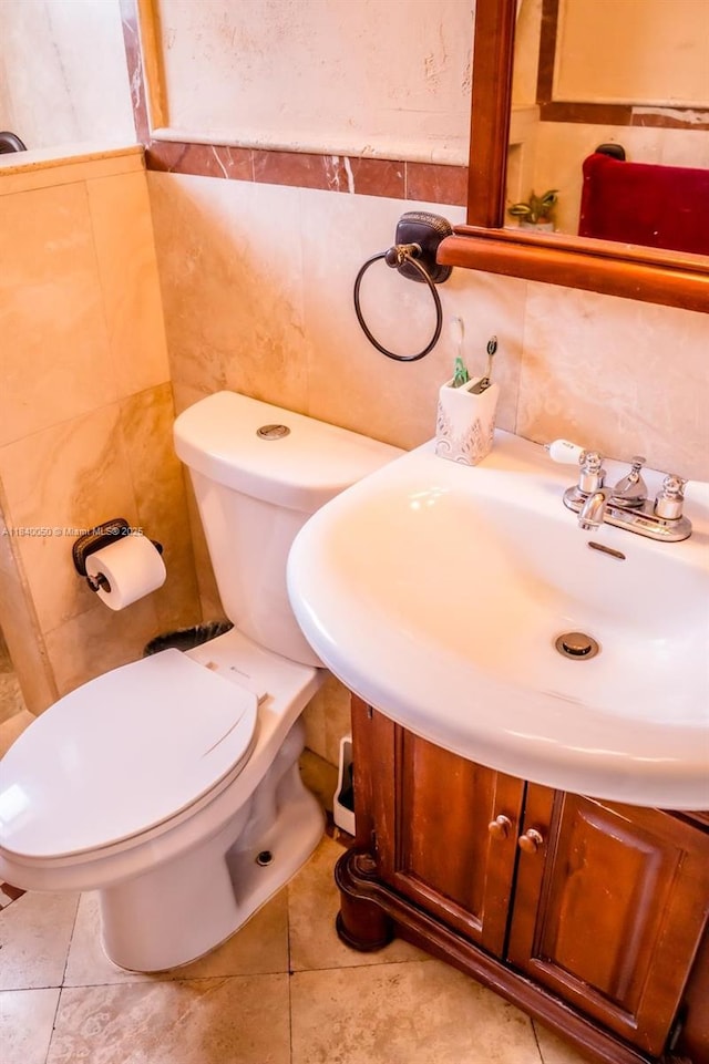 1004 NE 151st Ter, North Miami Beach, FL 33162 - half bathroom with vanity and tile walls