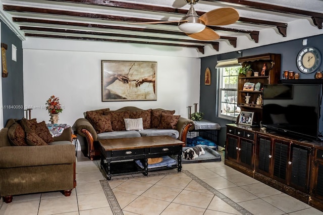 1004 NE 151st Ter, North Miami Beach, FL 33162 - living room featuring a ceiling fan, light tile patterned flooring, beam ceiling, and inlaid floor details