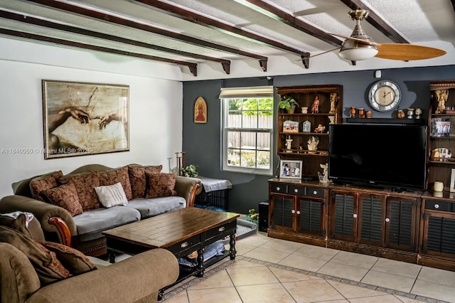 1004 NE 151st Ter, North Miami Beach, FL 33162 - tiled living room with ceiling fan and beam ceiling