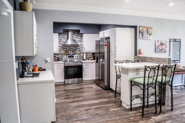 1004 NE 151st Ter, North Miami Beach, FL 33162 - kitchen with ornamental molding, stainless steel electric stove, refrigerator with ice dispenser, wall chimney exhaust hood, and light countertops