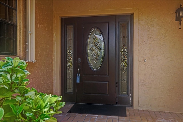 53 Northwoods Ln, Boynton Beach, FL 33436 - entrance to property with stucco siding