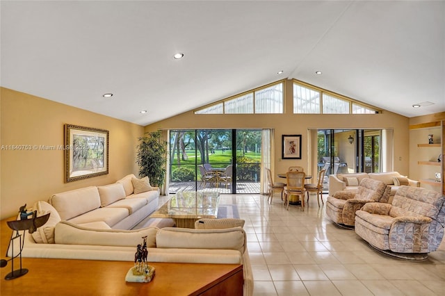 53 Northwoods Ln, Boynton Beach, FL 33436 - living room with light tile patterned floors, lofted ceiling, plenty of natural light, and recessed lighting