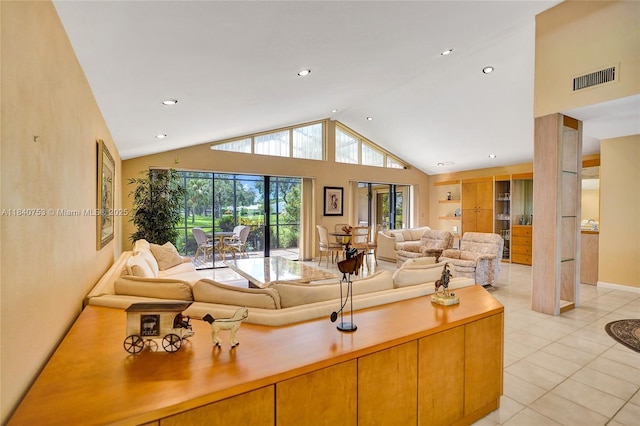 53 Northwoods Ln, Boynton Beach, FL 33436 - living area with light tile patterned floors, recessed lighting, and high vaulted ceiling