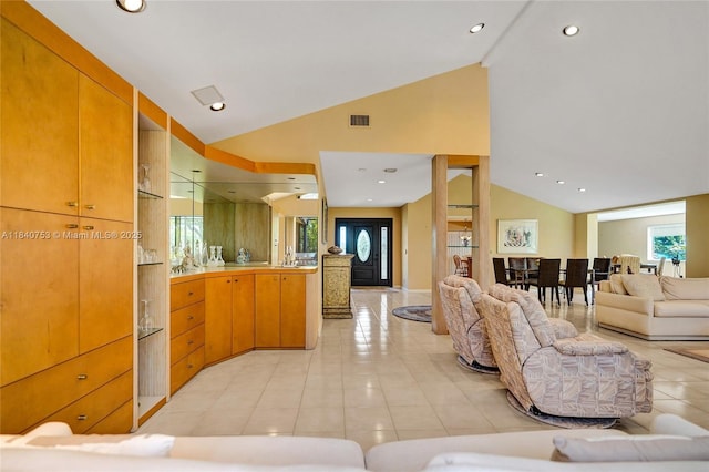 53 Northwoods Ln, Boynton Beach, FL 33436 - living room featuring vaulted ceiling, light tile patterned floors, and recessed lighting