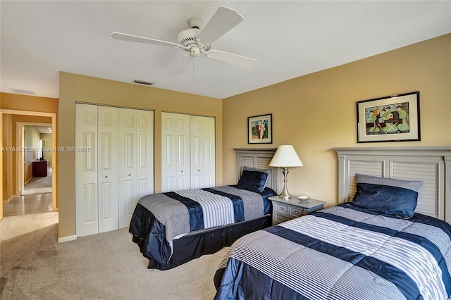 53 Northwoods Ln, Boynton Beach, FL 33436 - bedroom featuring carpet floors, two closets, and ceiling fan