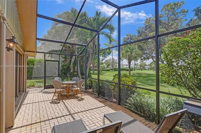 53 Northwoods Ln, Boynton Beach, FL 33436 - sunroom / solarium with outdoor dining space