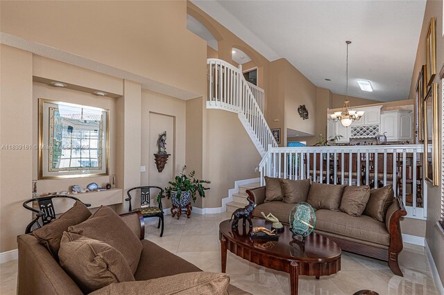 2188 NW 158th Ave, Pembroke Pines, FL 33028 - living area with stairs, a chandelier, and high vaulted ceiling