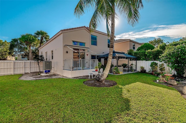 2188 NW 158th Ave, Pembroke Pines, FL 33028 - rear view of property with a gazebo, stucco siding, a fenced backyard, and a patio