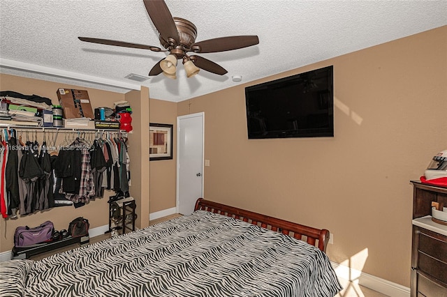 2188 NW 158th Ave, Pembroke Pines, FL 33028 - bedroom featuring a closet, a textured ceiling, and ceiling fan