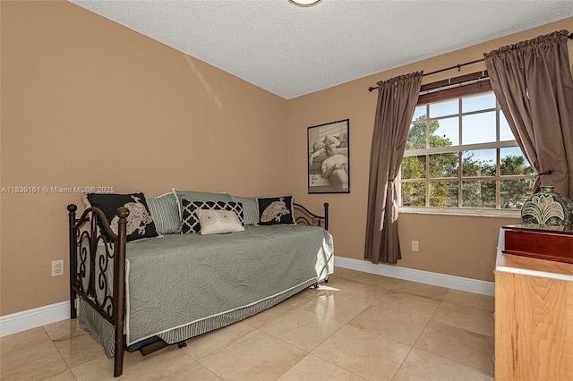 2188 NW 158th Ave, Pembroke Pines, FL 33028 - bedroom with a textured ceiling and light marble finish floors