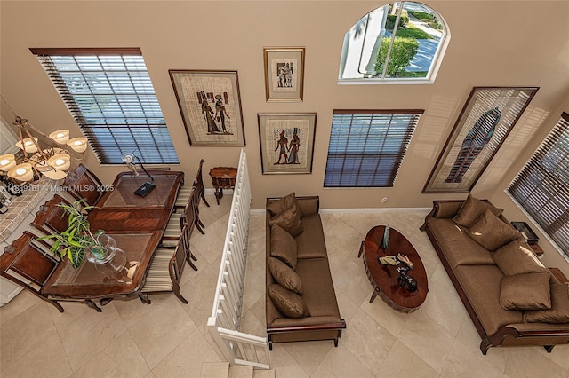 2188 NW 158th Ave, Pembroke Pines, FL 33028 - living area featuring plenty of natural light, tile patterned floors, and a chandelier