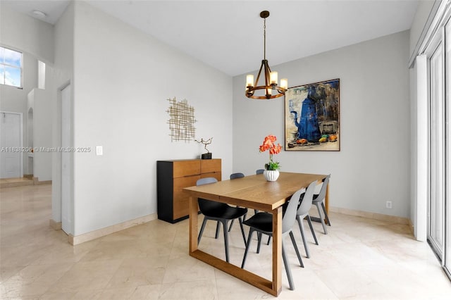 3758 SW 50th Ct, Hollywood, FL 33312 - dining area with a chandelier and baseboards
