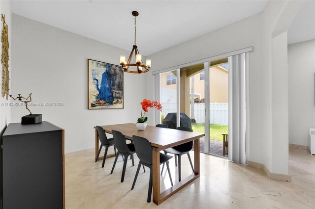 3758 SW 50th Ct, Hollywood, FL 33312 - dining area featuring arched walkways and a chandelier