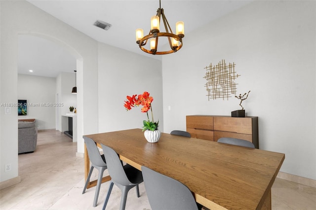 3758 SW 50th Ct, Hollywood, FL 33312 - dining room featuring arched walkways and a chandelier