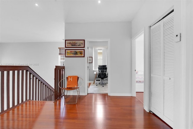 3758 SW 50th Ct, Hollywood, FL 33312 - hallway with an upstairs landing, wood finished floors, and an office area