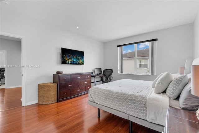3758 SW 50th Ct, Hollywood, FL 33312 - bedroom with wood finished floors, recessed lighting, and an office area
