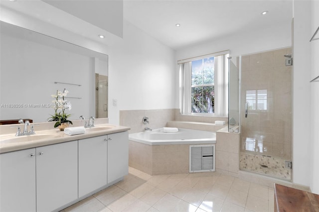 3758 SW 50th Ct, Hollywood, FL 33312 - bathroom featuring a bath, tile patterned flooring, a stall shower, double vanity, and recessed lighting