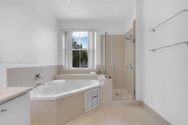 3758 SW 50th Ct, Hollywood, FL 33312 - bathroom with a bath, a stall shower, tile patterned floors, and vanity
