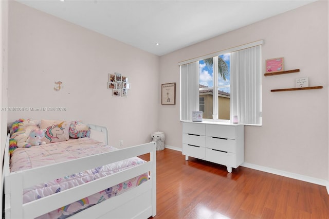 3758 SW 50th Ct, Hollywood, FL 33312 - bedroom with wood finished floors and baseboards