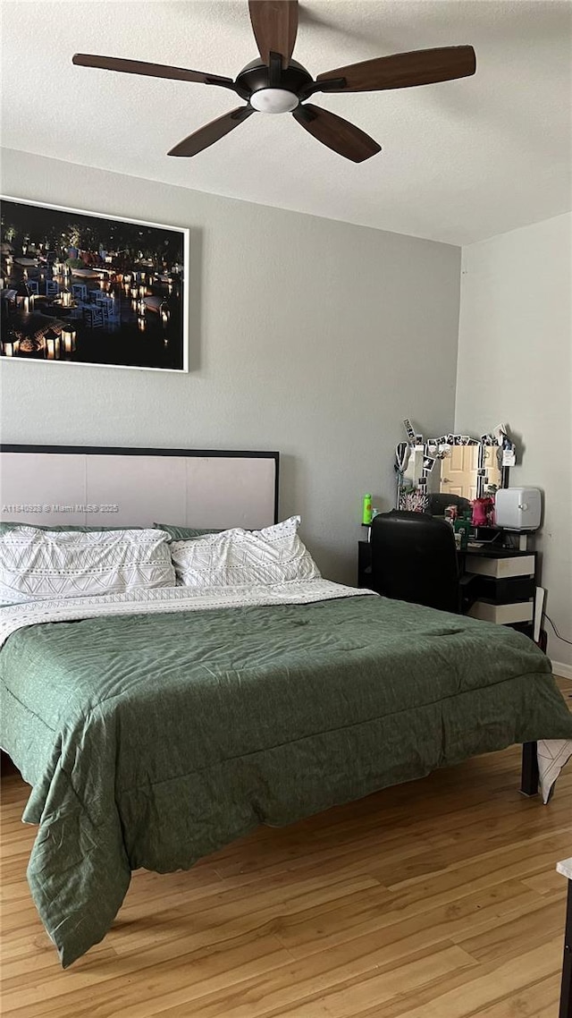 9087 SW 153rd Ct, Miami, FL 33196 - bedroom featuring wood finished floors and a ceiling fan