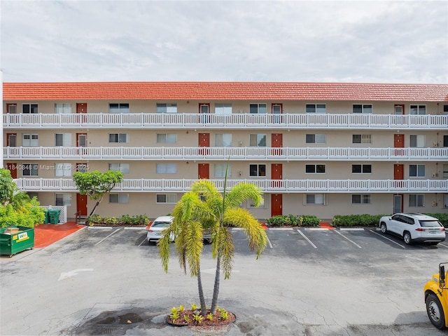 3581 Inverrary Dr Unit 308, Lauderhill, FL 33319 - view of apartment building / complex featuring uncovered parking