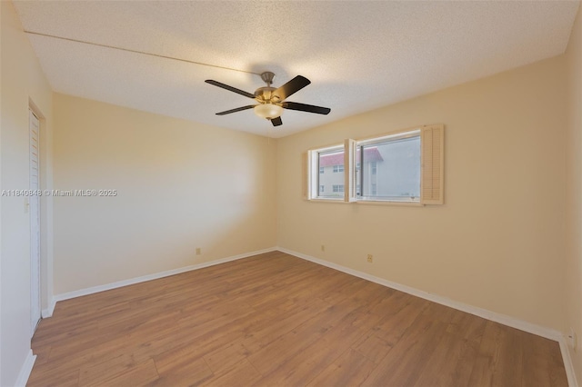 3581 Inverrary Dr Unit 308, Lauderhill, FL 33319 - unfurnished room featuring light wood-type flooring, ceiling fan, and a textured ceiling