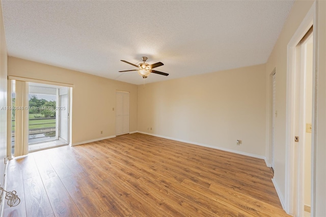 3581 Inverrary Dr Unit 308, Lauderhill, FL 33319 - spare room with light wood-style floors, ceiling fan, and a textured ceiling