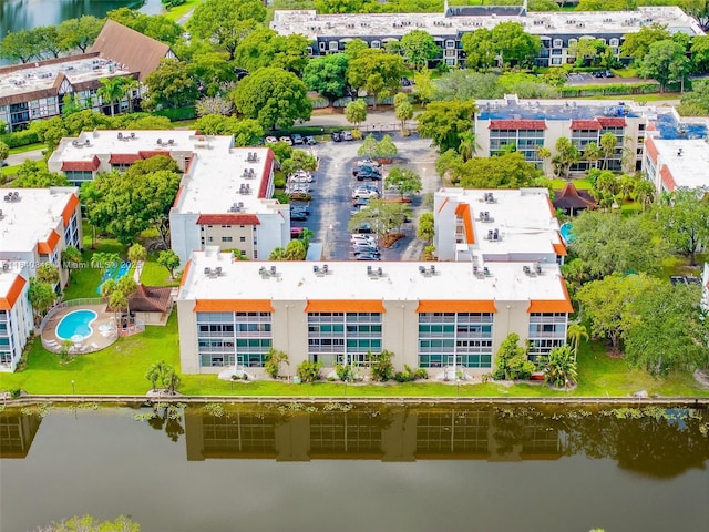 3581 Inverrary Dr Unit 308, Lauderhill, FL 33319 - drone / aerial view of a large body of water and apartment complex / building