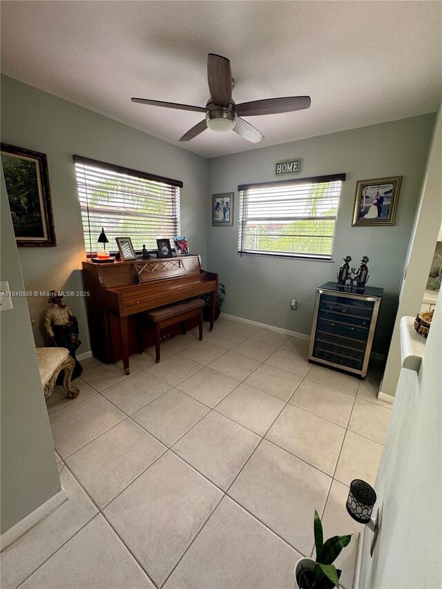 1501 SW 131st Way Unit 301P, Pembroke Pines, FL 33027 - living area featuring beverage cooler, light tile patterned flooring, and ceiling fan