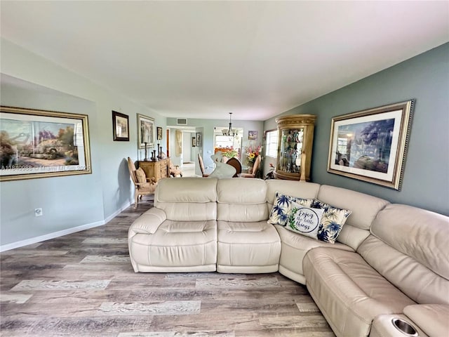 1501 SW 131st Way Unit 301P, Pembroke Pines, FL 33027 - living room featuring wood finished floors and a chandelier