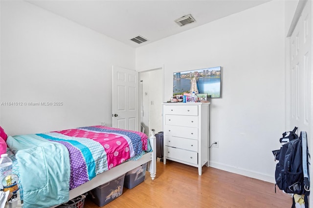 3135 NE 4th St, Homestead, FL 33033 - bedroom with wood finished floors and baseboards