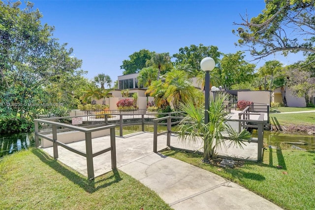 2215 Cypress Island Dr Unit 707, Pompano Beach, FL 33069 - view of home's community featuring a yard and a water view