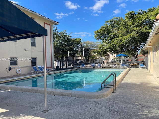 3276 NW 102nd Ter Unit 201-E, Coral Springs, FL 33065 - community pool featuring a patio area