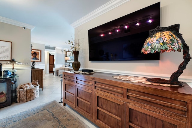 4000 Towerside Ter Unit 1005, Miami, FL 33138 - living area with crown molding, a wainscoted wall, and light tile patterned floors