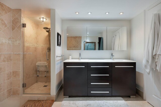 4000 Towerside Ter Unit 1005, Miami, FL 33138 - full bath with double vanity, a stall shower, tile patterned floors, and recessed lighting
