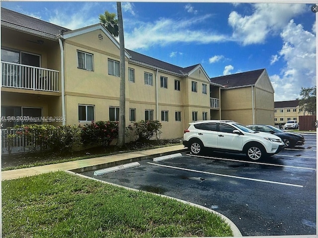 13810 SW 112th St Unit 106, Miami, FL 33186 - view of uncovered parking lot
