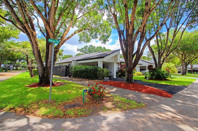 16041 Fairway Ter Unit 121, Weston, FL 33326 - view of front of house with a front lawn and stucco siding
