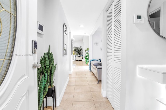 16041 Fairway Ter Unit 121, Weston, FL 33326 - hallway featuring light tile patterned flooring and recessed lighting