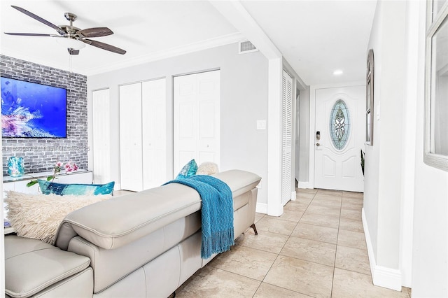 16041 Fairway Ter Unit 121, Weston, FL 33326 - living area with ceiling fan, recessed lighting, light tile patterned flooring, and crown molding