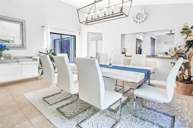 16041 Fairway Ter Unit 121, Weston, FL 33326 - tiled dining area featuring a high ceiling, crown molding, and a chandelier