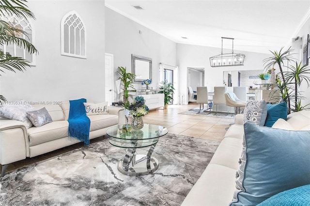 16041 Fairway Ter Unit 121, Weston, FL 33326 - living room with ornamental molding, a chandelier, high vaulted ceiling, and tile patterned floors