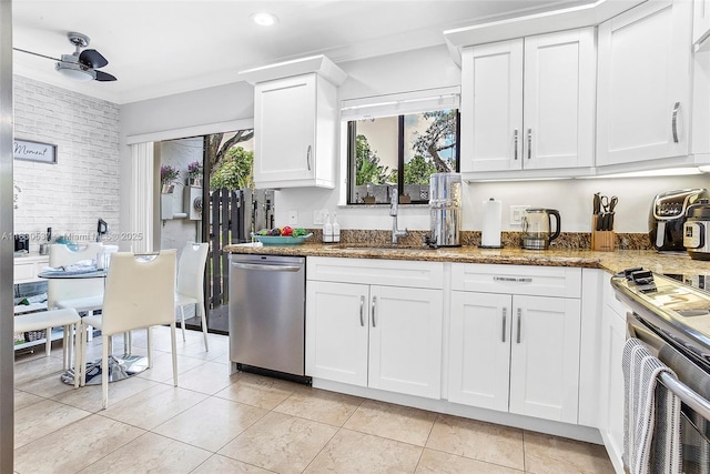 16041 Fairway Ter Unit 121, Weston, FL 33326 - kitchen with stainless steel dishwasher, white cabinetry, light stone counters, range, and recessed lighting