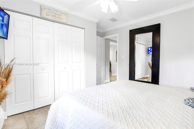 16041 Fairway Ter Unit 121, Weston, FL 33326 - bedroom featuring crown molding, a closet, light tile patterned floors, and a ceiling fan