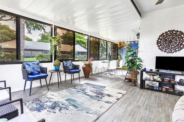 16041 Fairway Ter Unit 121, Weston, FL 33326 - sunroom / solarium featuring plenty of natural light, wood finished floors, and a wooden deck