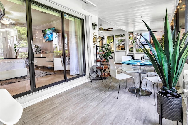 16041 Fairway Ter Unit 121, Weston, FL 33326 - sunroom / solarium with a ceiling fan, wood finished floors, and plenty of natural light
